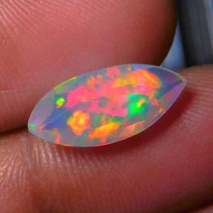 Full Play White Base AAA Faceted Ethiopian Opal Gemstone 15.3x6.7x4.7mm 1.8Cts - Picture 1 of 3
