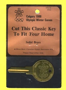 RARE 1988 CALGARY WINTER OLYMPIC GAMES BRASS KEY ! cut the key to fit your home - Picture 1 of 1