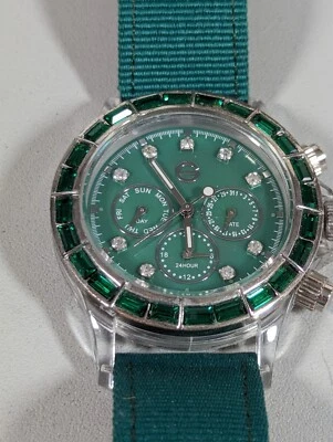 Reloj Banda Lona Verde Estuche Redondo Transparente Esfera Verde Chisme Acento Cristal Foto 1 de 4