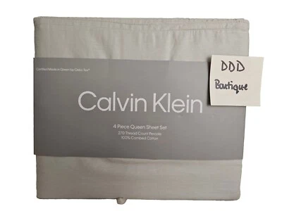 Nuevo en Paquete Juego de Sábanas Calvin Klein Satén 4 piezas Talla Reina Algodón Peinado Sólido Gris Claro Foto 1 de 4
