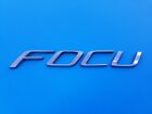 08 09 10 11 FORD FOCUS REAR TRUNK LID EMBLEM LOGO BADGE SYMBOL USED OEM (2008) Ford Focus
