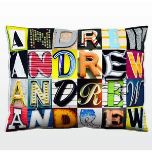 Personalisiertes Kissen mit dem Namen ANDREW auf Fotos von Zeichenbuchstaben - Bild 1 von 1