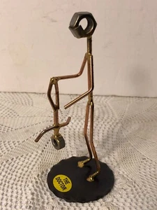 Rock Creek Metal Craft Sculpture: "THE DOCTOR" - HOLDING A BABY BY THE FEET - Picture 1 of 3