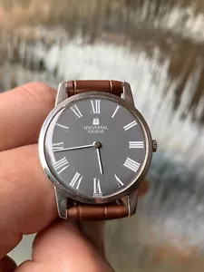 Splendido orologio vintage Universal Geneve 842.101 uomo vestito 31 mm swiss made grigio - Foto 1 di 11