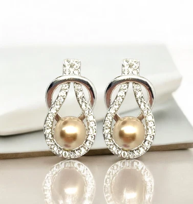 Stunning Bronze Reef Knot Swarovski Elements Crystal Earrings 18K Gold Plated - Image 1 of 4