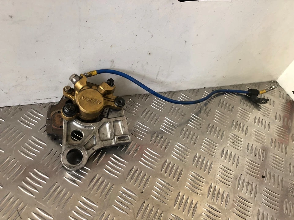 HONDA CBR600RR 2003 2004 RR3 RR4 PINZA TRASERA CON SOPORTE COLGANTE TRENZADO Foto 1 de 1