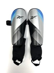 Reebok Fußball Schienbeinschoner M/L silber blau Polster Sport Lacross Schutz Erwachsene - Bild 1 von 11
