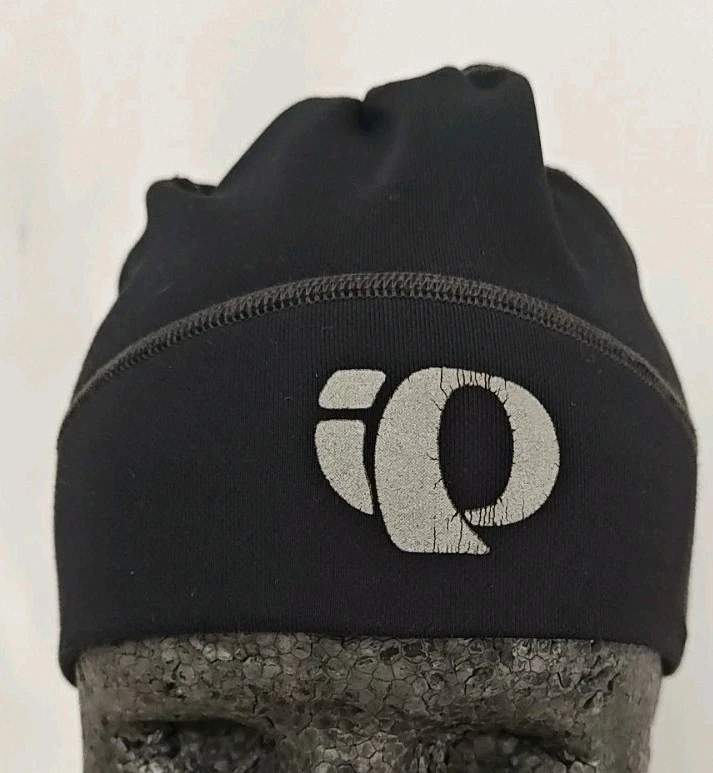 Gorra calavera Pearl Izumi negra gorra exterior calentador de cabeza punto elástico para el cabello Foto 1 de 4