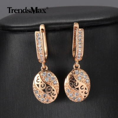 Pendientes colgantes de circón cúbico transparente ovalado de oro rosa 585 para mujer  Foto 1 de 4