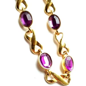 Pulsera de colección Avon infinito oro morado años 90 - Imagen 1 de 8