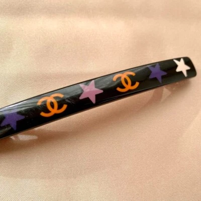 Pinza de pelo Chanel pasador negro usado Foto 1 de 4