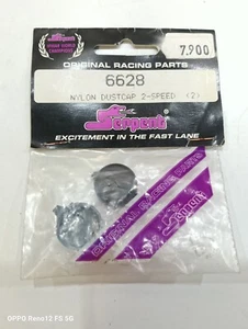 Serpent RC Nylon Dustcap 2 speed vintage spare parts n.6628 NIB - Imagen 1 de 1