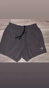 Pantalones cortos para hombre Gymshark talla pequeña sin forro gris cordón entrepierna 5 pulgadas - Imagen 1 de 8