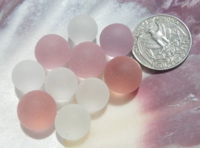 Sea Glass, Collection of Two Shades of Pink and Clear Marbles - Image 1 of 3