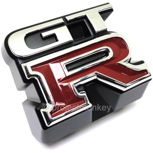 JDM Nissan 62896-24U00 95-98 GT-R R33 Front "GT-R" Emblem Badge GTR Genuine OEM - Foto 1 di 2
