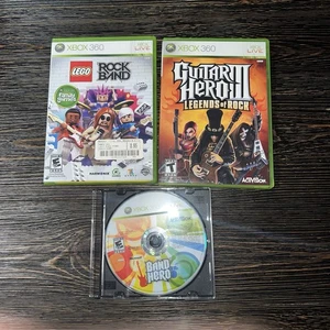 Xbox 360 Guitar Hero III, Lego Rockband, And Band Hero - Picture 1 of 5