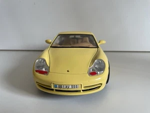 Burago Porsche 911 Carrera 1993 Yellow Diecast Model 1:18 - Picture 1 of 7