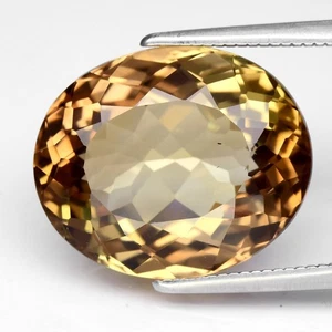 💎 12.04ct 15.2x12.7mm VS Oval Natural Champagne Topaz - Brazil Gemstone - Picture 1 of 4