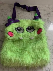 ACCESORIO DE BOLSILLO CORREA AJUSTABLE PARA NIÑAS JUSTICE MONSTER PIEL SINTÉTICA - Imagen 1 de 3