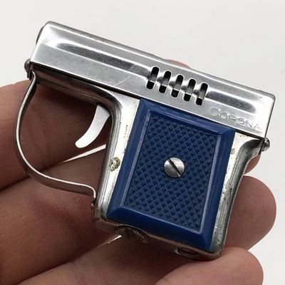 Pistola de colección Corona novedad pistola agarre azul encendedor Japón Foto 1 de 4