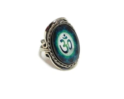 Anillo ajustable de metal plateado flor signo Om verde azulado boho naturaleza espiritual joyería Foto 1 de 2