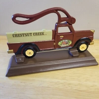 Metal nutcracker Chestnut Creek Farm truck cast iron on stand - Image 1 of 4