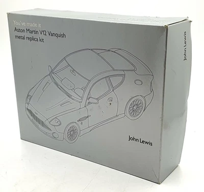 Burago 1/24 Scale Metal Kit 70063 2002 Aston Martin V12 Vanquish Silver - Image 1 of 4