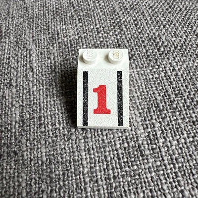 Lego 1x 3298p54 Slope 33 3 x 2 with Red Number 1, Black Stripes Pattern 6604 - Image 1 of 3