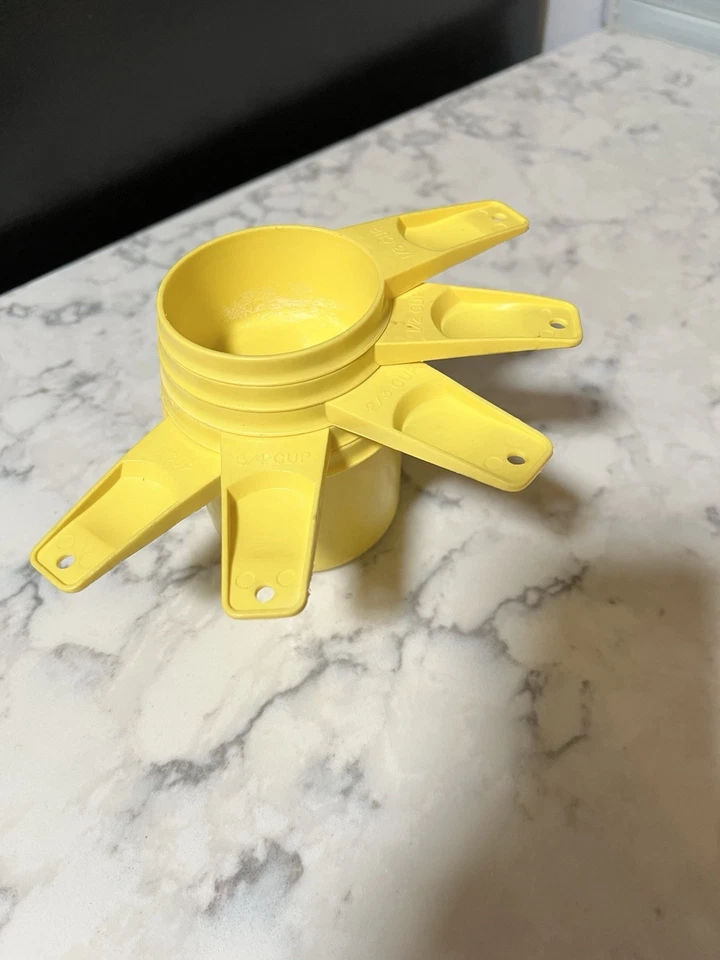 Vintage Set of Five Tupperware Measuring Cups, Yellow  - 1, 3/4, 1/2, 2/3, 1/3 - Image 1 of 4