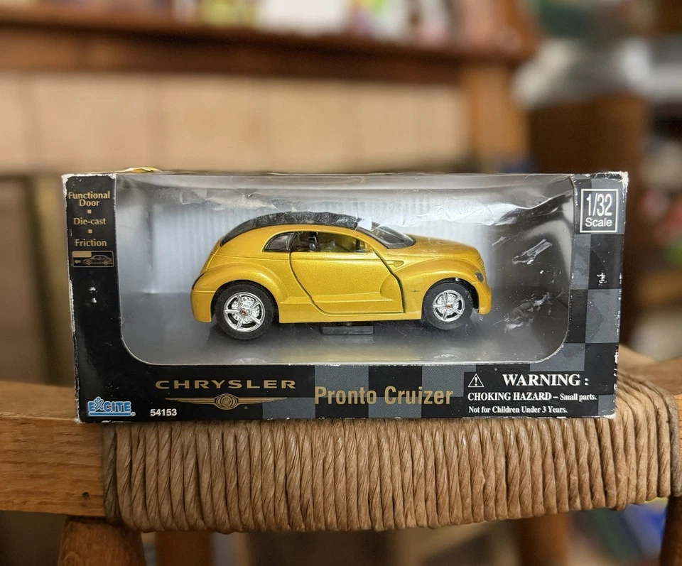 Chrysler Pronto Cruiser 1999 nuevo-ray coche fundido a presión escala 1:32 puertas abiertas doradas Foto 1 de 4