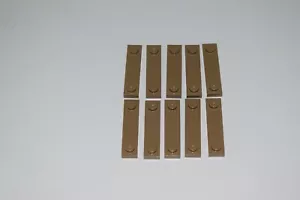 Lotto 10 pezzi Lego Dark Tan Plate 1 x 4 con due borchie con scanalatura (41740) E19 - Foto 1 di 1