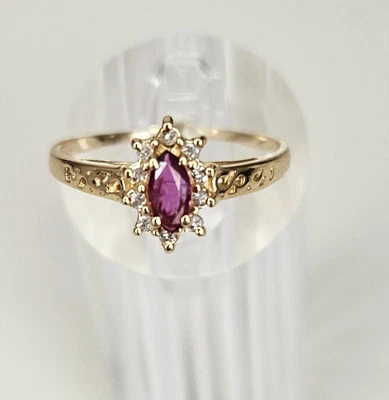 Impresionante anillo de diamantes y rubíes de oro de 14 K  Foto 1 de 4