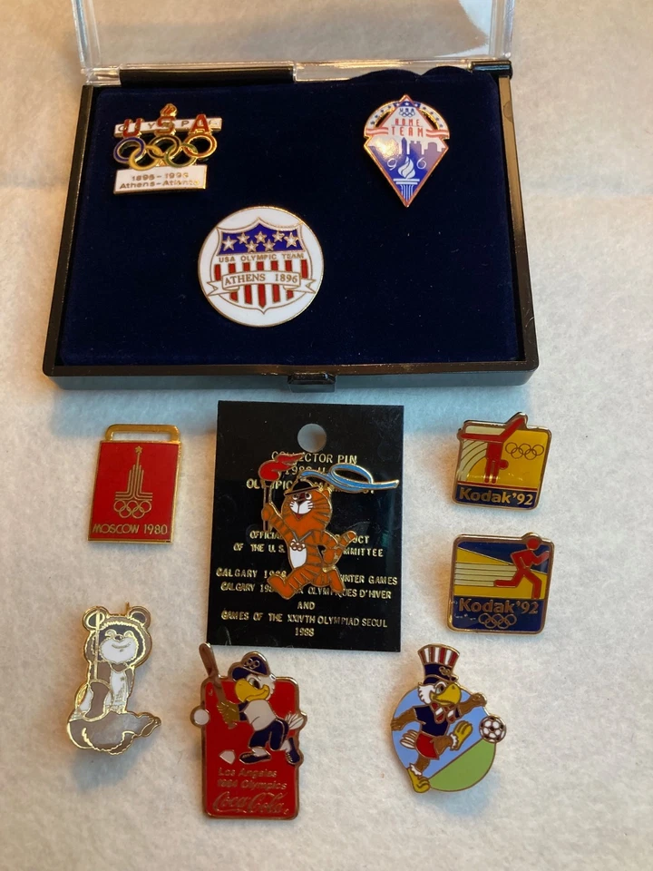 LOTE DE 10 PRENDEDORES OLÍMPICOS - 1980 1984 1988 1992 1996 Cocoa Cola Béisbol Fútbol Foto 1 de 4