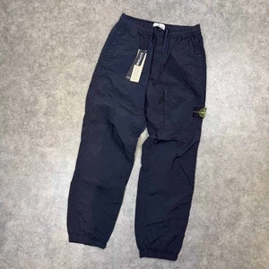 Pantalón cargo Stone Island azul marino tipo RE nailon metal pista precio de venta sugerido por el fabricante 460 GBP - Imagen 1 de 4