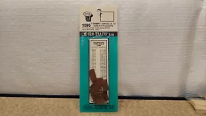N Micro Trains 1 Dozen Single & 1/2 Sheath Doors 1096 - Picture 1 of 3