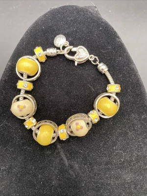 "Pulsera Pandora de 8"" con 11 cuentas de vidrio giratorio amarillo pedrería" Foto 1 de 4