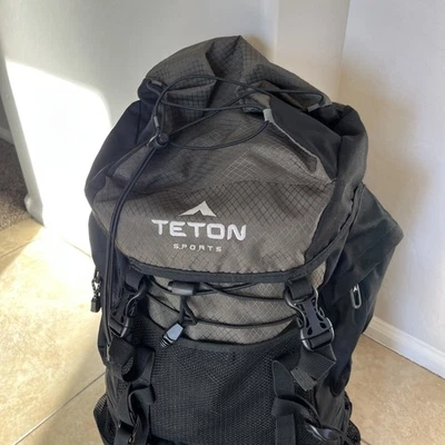 Mochila Teton Sports Scout 3400 Marco Interno Negra Senderismo con Cubierta de Lluvia 55L Foto 1 de 4