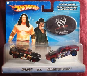 Vintage 2004 Hot Wheels WWE Wrestling Kane vs Undertaker - New 2 Car Pack - Picture 1 of 7