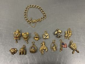 Vintage Monet Gold Toned Charm Bracelet 13 Charms 7” Bracelet