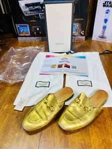 Pantofole Oro GUCCI Princetown 7-7,5 Mule Oro Cavallo BORSA DI SETA SCATOLA Autentiche - Foto 1 di 11