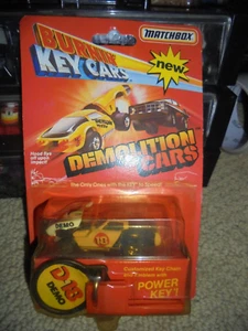 BRANDNEU MATCHBOX BURNIN KEY AUTOS ~ CORVETTE DEMOLITION CAR ~ NEUWERTIG AUF KARTE ~ SELTEN ~ RARITÄT - Bild 1 von 3
