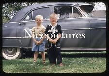 Children beside classic car 1950s original vintage slide