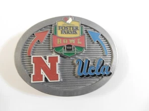 2015 NEBRASAKA HUSKERS FOOTBALL BELT BUCKLE NOS FOSTER FARMS BOWL GAME VS UCLA - Picture 1 of 2