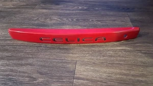 2000-2005 Toyota Celica Trunk License Plate Trim Bezel Molding Red OEM - Picture 1 of 9