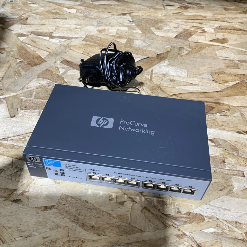 Conmutador administrado de 8 puertos HP ProCurve 1810G-8 (J9449A) con fuente de alimentación Foto 1 de 4