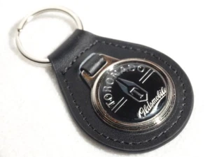 NEW RARE VINTAGE 1970s OLDSMOBILE TORONADO CAR BLACK Leather Key Chain Ring Fob - Foto 1 di 4