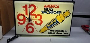 Letrero publicitario reloj iluminado Monroe Shocks vintage buen funcionamiento limpio - Imagen 1 de 5