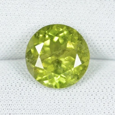 3.71 ct DEEP BROWNISH  YELLOW  GREEN  NATURAL IDOCRASE _ ROUND See Vdo SY - Image 1 of 2