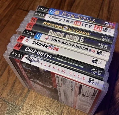 Lote de 8 juegos PS3 (PROBADOS)(Guitar Hero, Motorstorm, COD, Arkham City, más) Foto 1 de 4