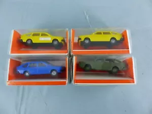 EURO MODEL lot de 4 voitures Volkswagen PASSAT échelle Ho 1:87 en boite TRAINS - Imagen 1 de 3